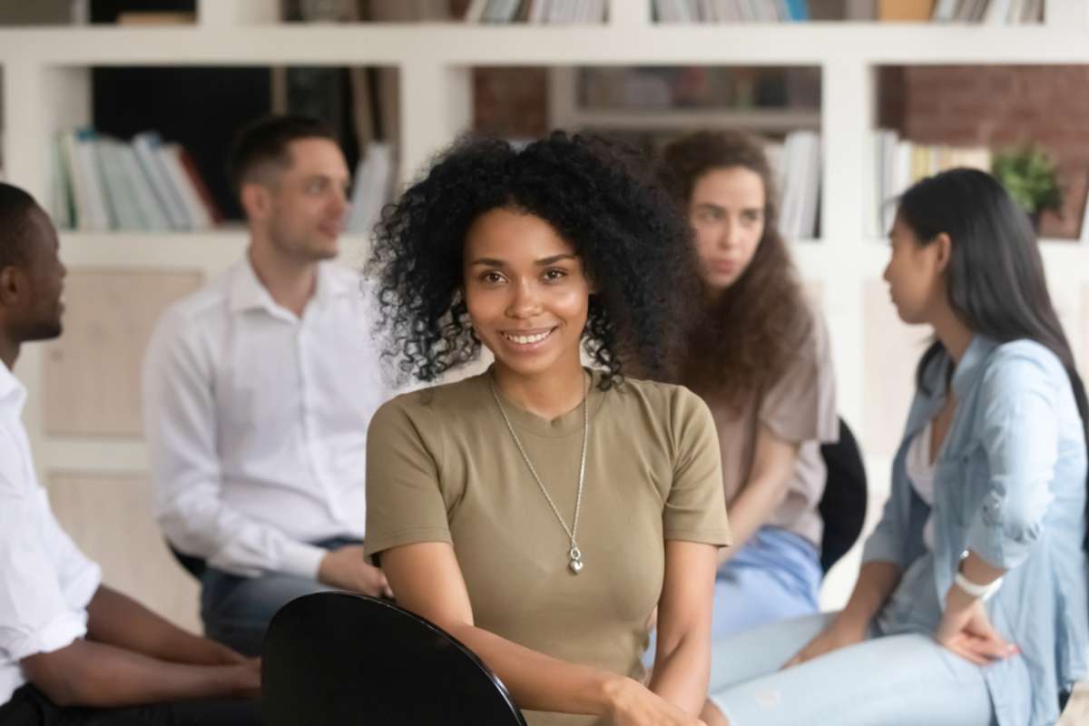 African american female psychologist psychotherapist looking at camera